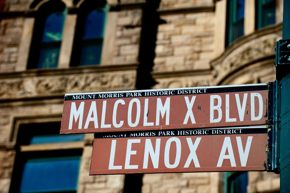New York Malcom X Blbd Lenox Avenue street sign in Harlem