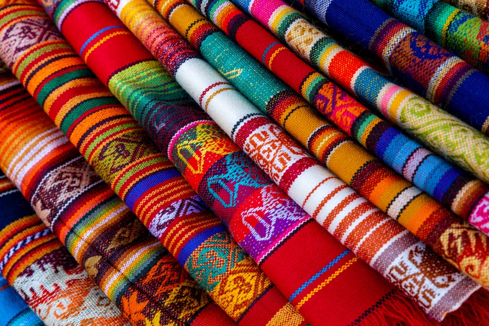 Close-up of colorful fabrics at the Otavalo Market on a day trip from Quito Eucador