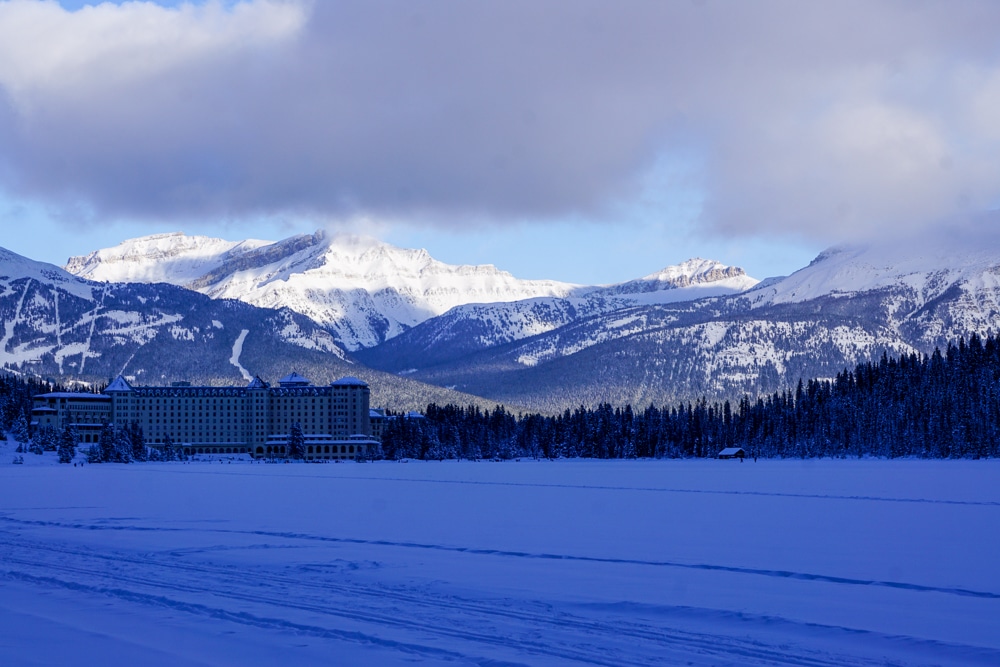Snowshoeing on Lake Louise at Banff National Park - Standing on the lake and looking back at the Fairmon Chateau Hotel