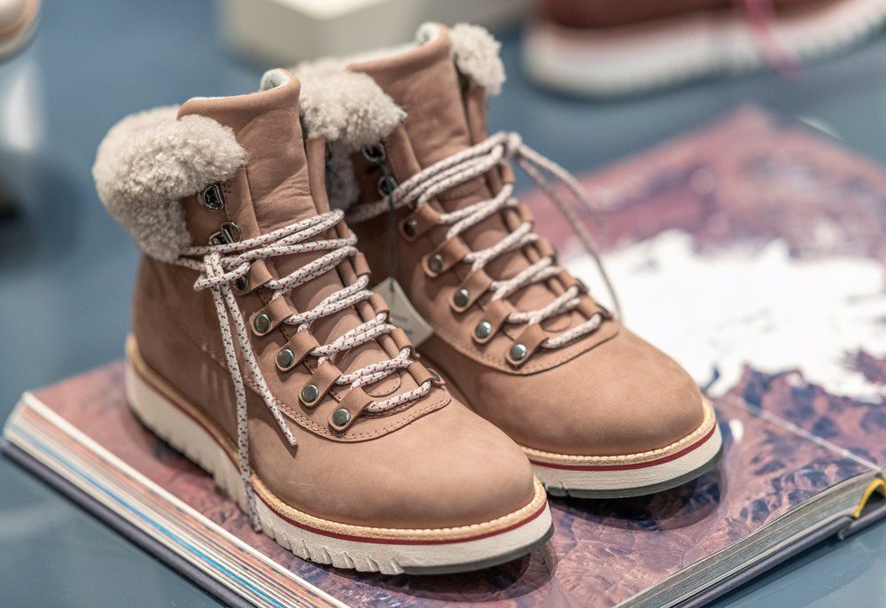 Pair of winter shoes in a shop showcase