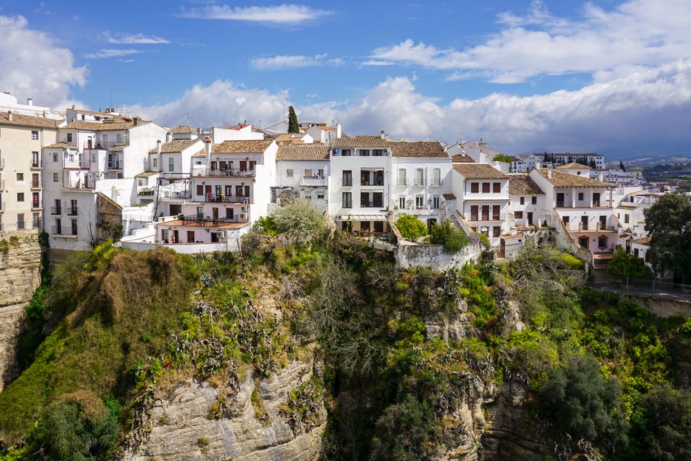 Ronda Spain view of white houses on the cliff overlooking the gorge