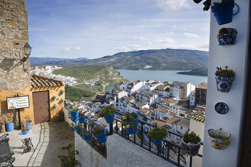 View of the reservoir of Iznajar from the courtyard of the comedies, Iznajar, Cordoba province, Andalucia, Spain