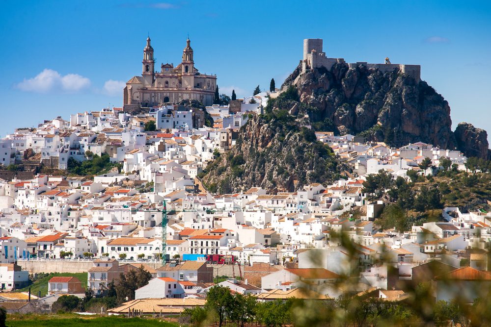 Olvera is a white village (pueblo blanco) in Sierra de Grazalema, Cadiz province, Andalucia, Spain - the Parroquia de Nuestra Senora de la Encarnacion (the Parish of Our Lady of the Incarnation) and the Moorish castle