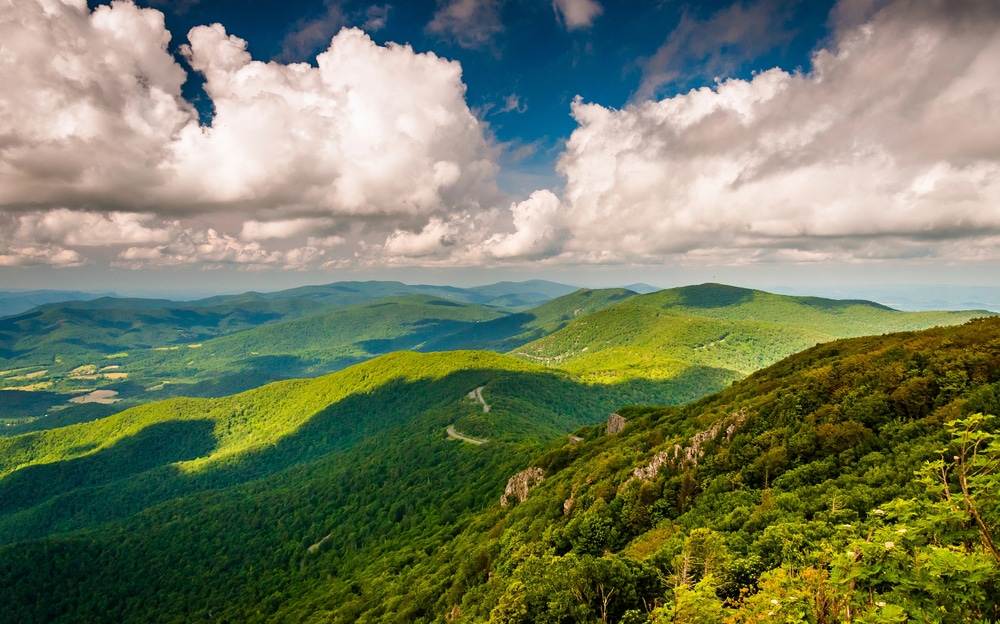 Blue sky day with big puffy white clouds overlooking Shenandoah Valley