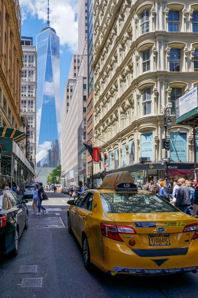 taxi driving in NYC toward one world trade center